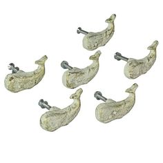 six cast iron ducky hooks on white background