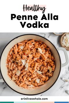 a pan filled with penne alla vodka on top of a marble counter