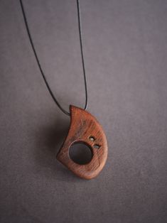 Hand made wooden necklace. The necklace is made of mulberry wood,the Latin name is Morus alba.More precisely, from a piece of trunk that is over a hundred years old. Dried mulberry wood hides this beautiful and warm structure whose beauty inspired me to make a necklace. Each of my necklaces is unique. Gift Wooden Bead Necklaces In Natural Wood, Handmade Mahogany Necklace For Gift, Natural Wood Necklaces With Wooden Beads For Gift, Rustic Wooden Beads Necklace As Gift, Rustic Wooden Bead Necklaces For Gifts, Rustic Wooden Beads Necklace For Gift, Handmade Wooden Necklace Gift, Brown Wood Necklace As Gift, Brown Wooden Necklace Perfect For Gifts