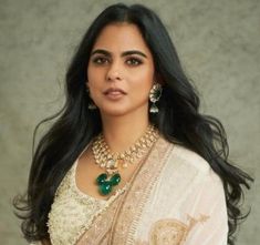 Isha Ambani-inspired emerald green kundan polki necklace. Designed with antique gold-plated jadau and a stunning pendant, this Sabyasachi-inspired statement piece adds a touch of regal sophistication to any ensemble. Perfect for special occasions, it embodies timeless Indian luxury and craftsmanship. *𝐏𝐑𝐎𝐃𝐔𝐂𝐓 𝐃𝐄𝐓𝐀𝐈𝐋* * Material: Brass * Plating: Gold Plated. * Stone: Semi Precious Kundan, Polki & Emerald Model Picture for Reference. *𝐃𝐈𝐒𝐂𝐋𝐀𝐈𝐌𝐄𝐑* Product color may slightly vary due to photographic lighting sources or your screen settings. *𝐌𝐎𝐑𝐄 𝐄𝐗𝐂𝐋𝐔𝐒𝐈𝐕𝐄 𝐂𝐎𝐋𝐋𝐄𝐂𝐓𝐈𝐎𝐍* https://www.etsy.com/listing/1626678624/ https://www.etsy.com/listing/1754154794/ https://www.etsy.com/listing/1698131252/ https://www.etsy.com/listing/1757778299/ Luxury Designer Kundan Necklace, Luxury Kundan Necklaces For Statement Jewelry, Elegant Temple Necklace With Zari Work For Navratri, Traditional Emerald Necklace For Festive Occasions, Traditional Festive Emerald Necklace, Elegant Heavy Kundan Necklace For Navratri, Festive Temple Jewelry Emerald Necklace For Reception, Festive Bollywood Emerald Necklace, Traditional Kundan Emerald Necklace For Reception