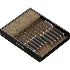 a set of six pencils sitting in a wooden box on top of a carpeted floor