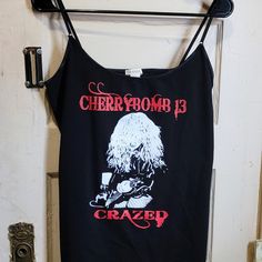 Spaghetti Strap Band Tee... Personalized Crazed.. Bassist More Than One Available..Some Stretch.. Sexy Fit!!.. Size Med.. You Can Ask Me If There Are Any Other Sizes Bundle And Save! Spring Grunge Tank Top, Spring Band Merch Fitted Tops, Black Tank Top With Graphic Print, Edgy Camisole Tops For Summer, Edgy Summer Camisole Top, Alternative Style Tank Top For Concerts, Edgy Spaghetti Strap Tops For Summer, Alternative Style Tank Top For Summer, Spring Sleeveless Band Merch Tops