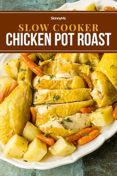 slow cooker chicken pot roast on a plate with potatoes and carrots in the background