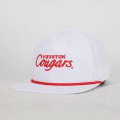 White Houston Cougars hat with Houston Cougars embroidered in red. Light weight nylon fabric Adjustable snapback closure Woven rope across the base of the front panel Unstructured front panel Officially Licensed University of Houston Hat Collegiate Adjustable Snapback Trucker Hat, Collegiate Adjustable Flat Brim Baseball Cap, Collegiate Flat Brim Baseball Cap Adjustable, Collegiate Adjustable Fitted Hat With Flat Brim, Collegiate Fitted Hat With Adjustable Flat Brim, White Snapback Hat For College, Adjustable Flat Brim Fitted Hat Collegiate Style, White Curved Brim Snapback Hat For College, White Adjustable Snapback Hat For College