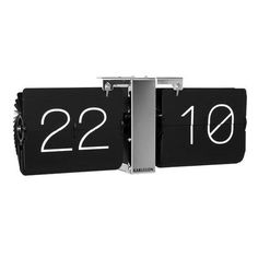 two black and white clocks with numbers on them