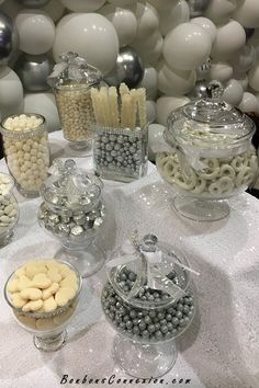 an assortment of desserts and candies on a table