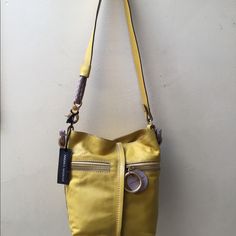 Mustard Color Bag, Gold Detailing In Zipper, Brand New With Tags. Original Value $400. Can Be Used Two Ways. Getting Rid Of My Belongings To Fund My Daughter Through Nursing School. Comes With Dust Bag! Designer Gold Bucket Bag For Everyday Use, Designer Shoulder Bag With Leather Handles In Yellow, Designer Yellow Shoulder Bag With Leather Handles, Yellow Pouch Bag For Shopping, Yellow Crossbody Bag For Errands, Designer Yellow Bags For Everyday Use, Yellow Pouch Shoulder Bag With Adjustable Strap, Yellow Crossbody Bucket Bag For Daily Use, Yellow Shoulder Bag With Gold-tone Hardware For Daily Use