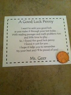 a penny sitting on top of a piece of paper with a poem written in it