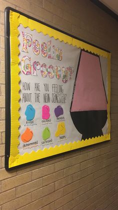 a bulletin board hanging on the wall in a school hallway that says, peddling arrows how are you feeling about the new something?