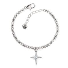 Inspired by magical bursts of light, this bracelet depicts a beautiful modern cross design. Elegant Silver Cross Beaded Bracelets, Elegant Silver Beaded Cross Bracelets, Elegant Adjustable Cross Beaded Bracelets, Bracelet Inspired, Unique Gift Items, Linen Spray, Handbag Charms, Vase Candle Holder, Jewelry Tree