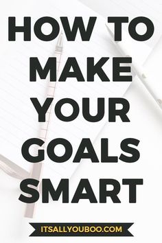 a notepad with the words how to make your goals smart on it and an image of