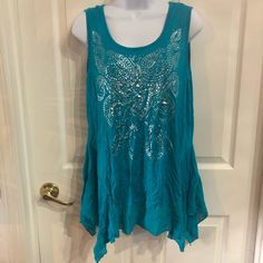 Brand New With Tag Color Like Teal/Blue Size Medium Turquoise Sleeveless Top For Vacation, Blue Bohemian Sleeveless Blouse, Blue Sleeveless Bohemian Blouse, Long Tank Tops, Navy Blue Top, Ruffle Tank Top, Floral Sleeveless Top, Long Tank, Tunic Tank Tops