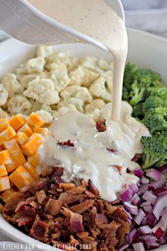 broccoli, cauliflower, and other vegetables are mixed together in a bowl