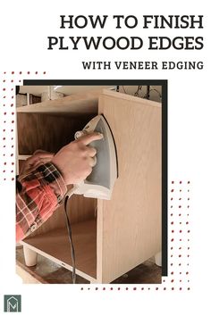 a person is using an electric device to fix a cabinet with the help of a wood edge