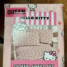 the hello kitty bedding set is pink and white