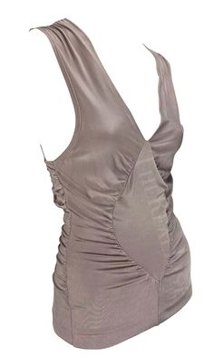 For Sale on 1stDibs - Presenting an incredible blush Yves Saint Laurent sleeveless top, designed by Tom Ford. From the Spring/Summer 2003 collection, this slinky top features Tom Ford Blush, Sleeveless Top Designs, Rive Gauche, Tom Ford, Yves Saint Laurent, Sleeveless Top, Saint Laurent, Blush, Ford