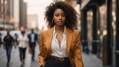 Elevate your everyday look with a tailored beige blazer, crisp white blouse, and dark wash jeans.  Accessorize with statement earrings for a touch of personality.

#InspireInclusion #InvestInWomen #WomenWhoCode #SheLeads #WomenInSTEM #IWD Crisp White Blouse, Office Chic, Beige Blazer, Business Wear, Chic Office, Dark Wash Jeans