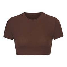 A Form-Fitting Crew Neck With Buttery Soft Feel, This Is A Flattering Crop T-Shirt Option To Wear Alone Or Styled With Other Pieces. High Neck Crewline, Super Cropped, Slim Fit, Short Sleeves Aslayy Is A Size 2 And 5’ 9”, Wearing A Skims S 76% Polyamide / 24% Elastane Machine Wash Cold, Non Chlorine Bleach, Cool Iron, Do Not Dry Clean Imported Solid Stretch Crop Top, Solid Color Stretch Crop Top, Basic Seamless Solid Tops, Basic Solid Seamless Tops, High Stretch Seamless Short Sleeve Top, Fitted Solid Color Workout T-shirt, Seamless Snug Fit Short Sleeve Top, Sporty Brown Stretch Top, Brown Summer Workout Tops