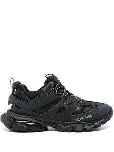 It is no surprise that anything Balenciaga conjures up rises to cult status. This season, expect more iconic handbags, contemporary footwear with a retro feel and logo-sprawled surfaces. The signature style of the season, these black track sneakers feature a round toe, a lace-up front fastening, a logo patch at the tongue, a printed logo, a pull tab at the rear, branded heel counter and a chunky rubber sole. Iconic Handbags, Track Sneakers, Balenciaga Shoes Sneakers, Balenciaga Track, Balenciaga Shoes, Iconic Bags, Logo A, Flat Boots, Exclusive Fashion