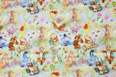 winnie the pooh and friends fabric with many different characters on it