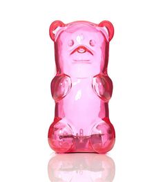 a pink gummy bear on a white background