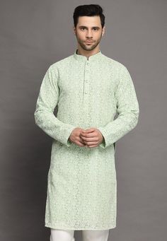 Faux Georgette Kurta in Sea GreenThis Readymade piece is Enhanced with Buttons, Chikankari and Thread Work. Crafted in Chinese Collar Neck and Full SleeveDo note: Bottom shown in the image is for presentation purposes only. Half to one inch may vary in measurement. (Slight variation in actual color vs. image is possible) We sell all kinds of menswear. Mens Kurta | Mens Kurta Pajama | Mens Sherwani | Mens Sherwani Sets | Traditional Menswear | Partywear Menswear | Indian Mens Dresses | Diwali Kur Ceremonial Pista Green Kurta With Chikankari Embroidery, Transitional Green Kurta With Self Design, Green Kurta With Motifs For Eid, Green Motifs Kurta For Transitional Season, Transitional Green Kurta With Motifs, Green Straight Kurta With Motifs, Pista Green Traditional Wear With Chikankari For Transitional Season, Green Long Sleeve Kurta With Motifs, Fitted Green Kurta With Motifs