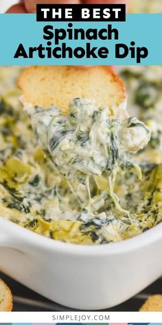 spinach artichoke dip in a white bowl with bread on the side and text overlay that reads, the best spinach artichoke dip