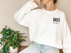 Boss Babe Sweatshirt A sturdy and warm sweatshirt bound to keep you warm in the colder months. A pre-shrunk, classic fit sweater that's made with air-jet spun yarn for a soft feel and reduced pilling. * 50% cotton, 50% polyester * Pre-shrunk * Classic fit * 1x1 athletic rib knit collar with spandex * Air-jet spun yarn with a soft feel and reduced pilling * Double-needle stitched collar, shoulders, armholes, cuffs, and hem Jessica Anderson, Mrs Sweatshirt, Dance Mom, Faith Shirt, Mama Sweatshirt, Cotton Pullover, Jesus Shirts