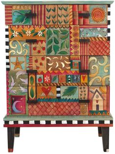 an artisticly painted chest with many different designs on it's sides and drawers