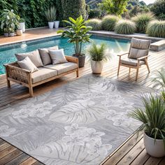 an outdoor area with a pool and wooden decking