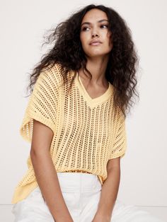 This oversized sweater is knitted using an open, mesh-like stitch in our chunky, mercerized cotton yarn—a special process that produces a smoother, silkier handfeel with a signature luster.  Oversized fit.  Organic: Made with certified, organically grown cotton that's easier on the earth.  V-neck.  Straight hem with vented sides.  *This style is unlined.  Oversized fit.  Short, dolman sleeves.  Above-hip length.  Model: Size S, 5'10" (178cm). Mercerized Cotton Yarn, Dolman Sweater, Preppy Look, Preppy Summer, Cape Dress, Women's Sweaters, Outerwear Sweater, Oversized Sweater, Cashmere Sweaters