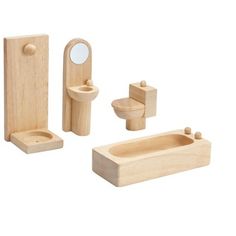 wooden toy bathroom set with mirror, sink and toilet in natural wood finish on white background