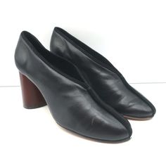 Celine Wood Heel Pumps Black Suede-Trimmed Leather Size 38.5 Pre-Loved. Good Condition. No Major Flaws, Small Scuffs Throughout. Wear On Tips Of Toes. Rubber Soles Have Been Added For Extra Traction. Does Not Come With Box Or Dustbag. Fits Like A Us 8 -**- Insole 9.75" Exterior Sole 10" Specific Heel Height 3 3/8" Black Leather Shoes For Fall Formal Occasions, Black Calf Leather Shoes With Almond Toe, Black Calf Leather Almond Toe Shoes, Black Square Toe Leather Shoes For Office, Black Almond Toe Calf Leather Shoes, Black Leather Shoes For Galas With Pointed Toe, Chic Fall Court Shoes With Leather Sole, Black Slip-on Court Shoes For Fall, Leather Slip-on Heels With Sculpted Heel