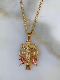 Tricolor gold plated caravaca cross with amazing detailing. It sits on a classic gold plated figaro chain. Please select length.This is a unisex medium to somewhat large sized cross. Not including the bail, it is 1 1/2 inches long, and almost 1 inch wide, at its widest point. Crucifix Cross Necklace With Figaro Chain As Gift, Gold Cross Necklace With Figaro Chain, Figaro Chain Cross Pendant Necklace For Gift, Rosary Bracelet, Kids Necklace, Figaro Chains, Figaro Chain, To My Mother, Classic Gold