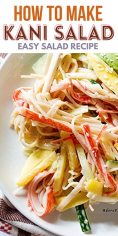 a white plate topped with pasta and veggies