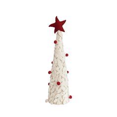 a white ceramic christmas tree with red stars