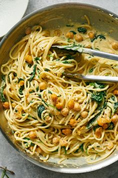 pasta with spinach and chickpeas in a pan