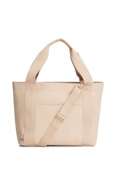 Béis 'The BEISICS Tote' in Beige - Large Beige Tote Bag With Zipper Rectangular Travel Bag With Adjustable Handle For Everyday, Everyday Tote Travel Bag With Adjustable Handle, Everyday Tote Weekender Bag With Adjustable Handle, Everyday Weekender Tote Bag With Adjustable Handle, Sporty Shoulder Bag With Adjustable Strap For Weekend, Versatile Weekend Bag With Adjustable Strap, Sporty Everyday Beige Bag, Sporty Beige Bag For Everyday Use, Designer Laptop Bag