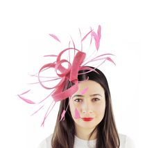 Hats By Cressida Kentucky Derby & Ascot Fascinator Hats Fuchsia Pink Nerissa Sinamay Fascinator Pretty fuchsia pink sinamay loops with fuchsia pink coque and biot feathers Fascinator hat body measures about 7-8 Inches wide,longer with feathers Mounted with a matching headband. If you prefer a headband to match your hair, please make a note at check out what colour headband you want. Our Nerissa Feather Fascinator is ideal for special occasions like Kentucky Derby, Royal Ascot, weddings, church a Pink Fascinator For Kentucky Derby Ceremony, Pink Adjustable Hat For Ceremony, Adjustable Pink Hat For Ceremony, Pink Headpiece For Kentucky Derby Ceremony, Pink Summer Fascinator For Ceremony, Pink Fascinator For Royal Ascot Ceremony, Pink Summer Ceremony Fascinator, Pink Mini Hats For Kentucky Derby Ceremony, Bridesmaid Headpiece