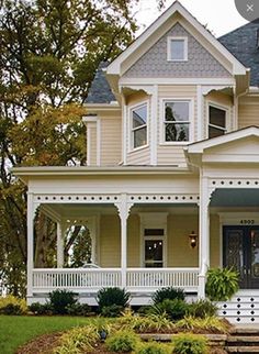 a house with white trim and two story