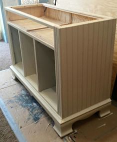 an unfinished entertainment center in the process of being built