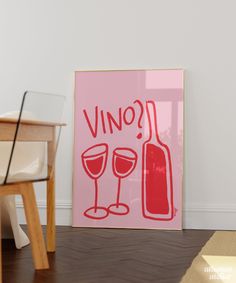 there is a wine glass and bottle on the floor next to a painting that says vino