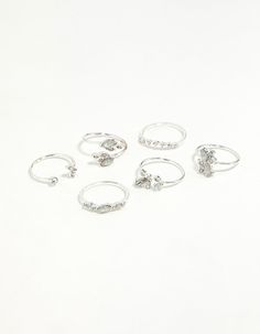 Make a statement in a stunning fashion ring. Stack with other styles for extra impact or wear alone for a refined addition to your ensemble. This ring pack features a silver-toned setting with diamante and gem embellishments. Weight: 15.0g | Lovisa Silver Gem Diamante Ring Pack, Size: Medium/Large Trendy Silver Crystal Promise Ring, Trendy Silver Crystal Ring For Wedding, Trendy Silver Crystal Wedding Ring, Trendy Silver Crystal Party Ring, Trendy Silver Jewelry With Diamond Accents, Silver Stackable Metal Midi Rings, Minimalist Silver Rings For Party, Silver Stackable Rings For Party, Trendy Silver Rings For Wedding