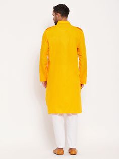 Vastramay Men's Mustard Pathani Suit With White Pant Set Make a statement with this stylish Pathani suit set from VASTRAMAY. Crafted from high-quality fabric, this set includes a mustard-colored Pathani kurta with white pants. Perfect for festive occasions or traditional gatherings, this outfit offers both style and comfort. Features: Stylish Pathani suit set Mustard-colored kurta White pants High-quality fabric Specifications: Brand: VASTRAMAY Color: Mustard (Kurta), White (Pants) Size: Availab Festive Long Sleeve Cotton Suit, Traditional Winter Cotton Unstitched Suit, Fitted Yellow Cotton Unstitched Suit, Yellow Cotton Straight Kurta Sherwani, Yellow Cotton Sherwani Straight Kurta, Cotton Straight Kurta Set For Winter, Winter Cotton Straight Kurta Set, Fitted Orange Cotton Kurta, Orange Cotton Long Sleeve Kurta