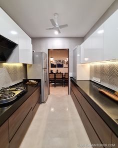 the kitchen is clean and ready to be used as a dining room or office space