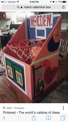 a cardboard box that is shaped like a basketball hoop