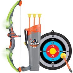 a toy archery set with an arrow, target and arrows on the back ground next to it