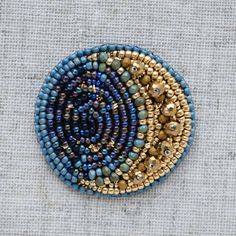 Moon Brooch Gold Blue Bead Brooch Celestial Embroidered Pin - Etsy Ukraine Embellished Jewelry With Round Beads For Gifts, Embellished Round Beads Jewelry Gift, Gift Jewelry With Embellished Round Beads, Bohemian Handmade Gold Brooches, Handmade Bohemian Gold Brooches, Pin Embroidery, Hand Embroidered Jewelry, Moon Brooch, Bead Brooch