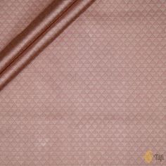 a close up view of a pink fabric with an intricate design on the back and sides