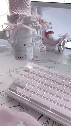 a computer keyboard sitting on top of a desk